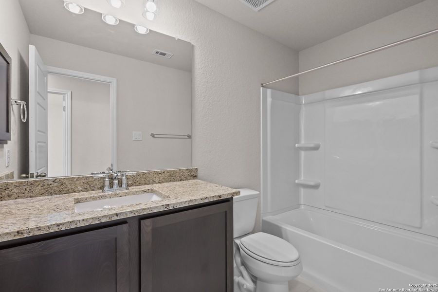 Furnished interior view inside a new home in , Poteet (Image 9).