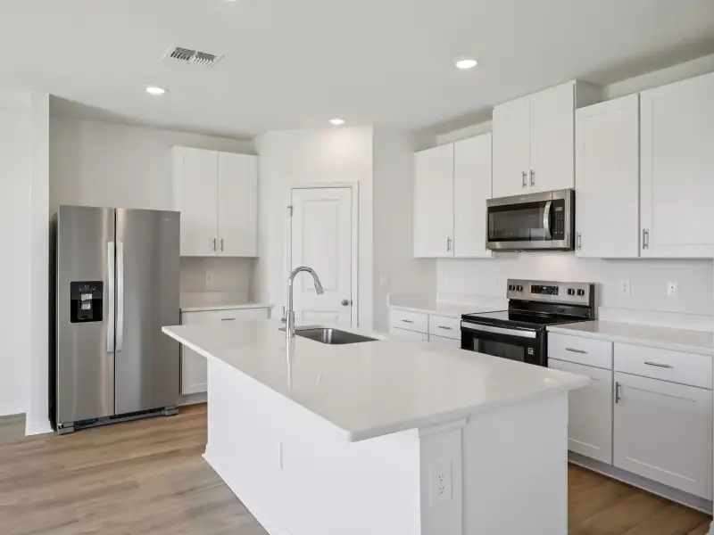 Furnished interior view inside a new home in Oakfield Trails - Premier Series, Parrish (Image 3).