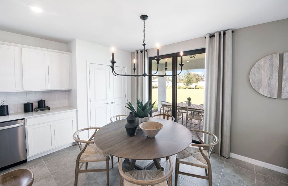 Representative furnished interior of a home built from the McNair by Centex in Whispering Lakes, Lehigh Acres (Image 18).