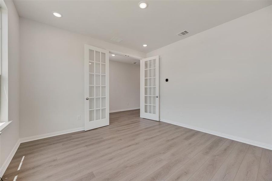 Spacious, unfurnished interior of a new home in Valencia On The Lake, Little Elm (Image 23).
