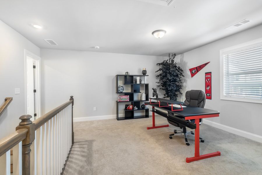 Furnished interior view inside a new home in Ridge Pointe, Athens (Image 32).