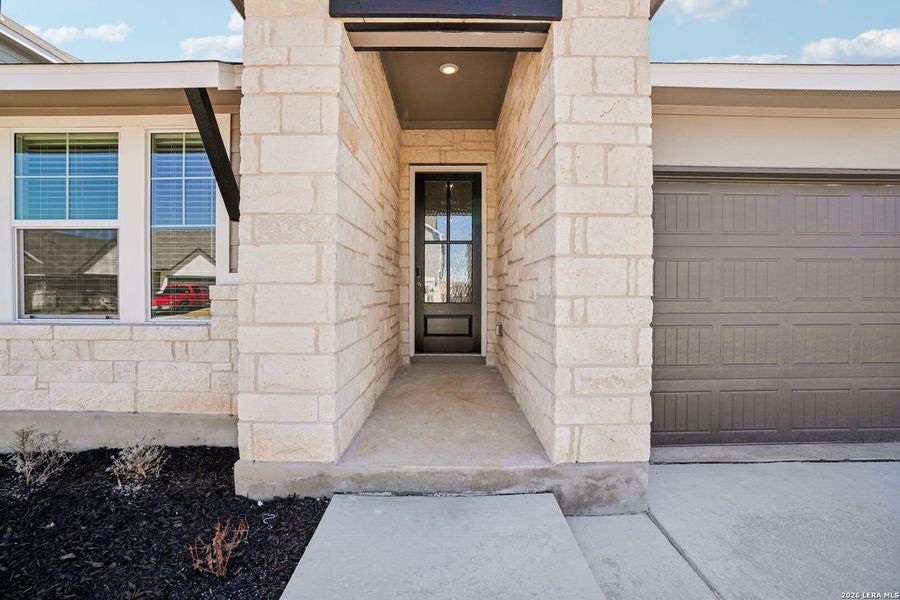 Exterior details and patio area of a home in Estancia Ranch - Classic Series, San Antonio (Image 3).