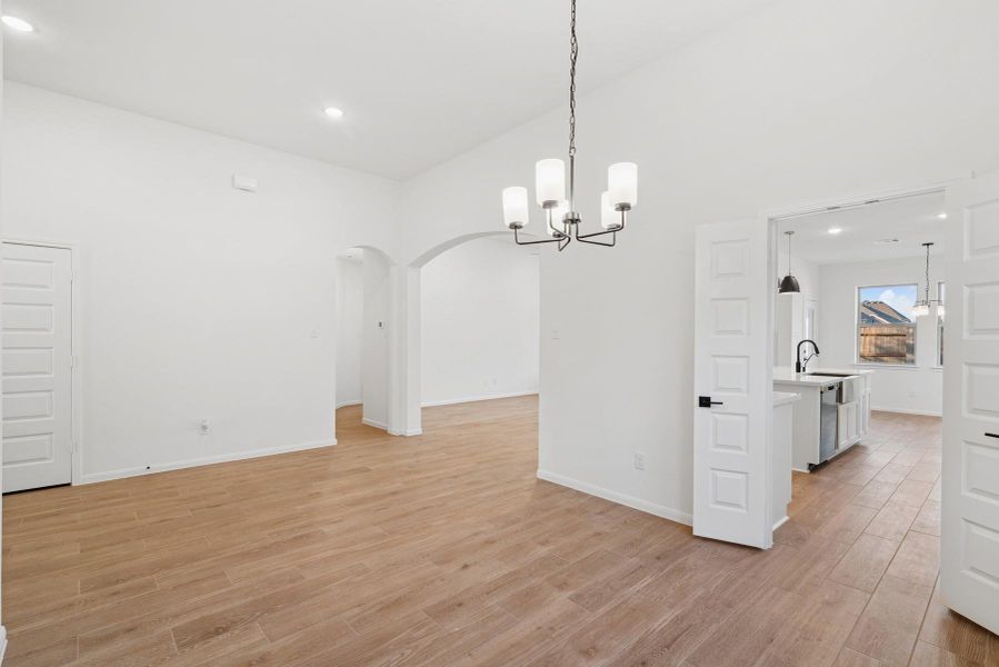 Formal dining room with access to the kitchen (*Photo not of actual home and used for illustration purposes only.)