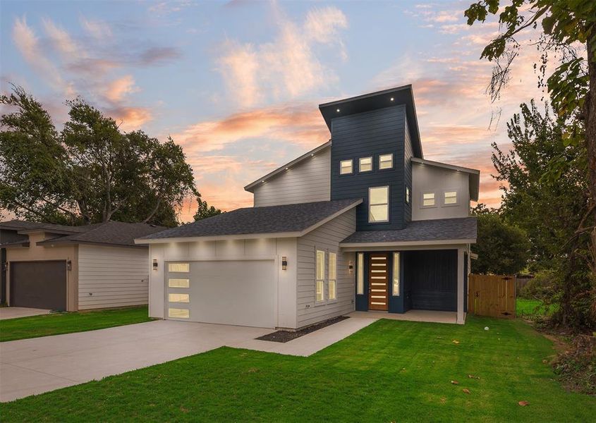 Contemporary home featuring a shingled roof, concrete driveway, a garage, and a porch Contemporary home featuring a shingled roof, concrete driveway, a garage, and a porch
