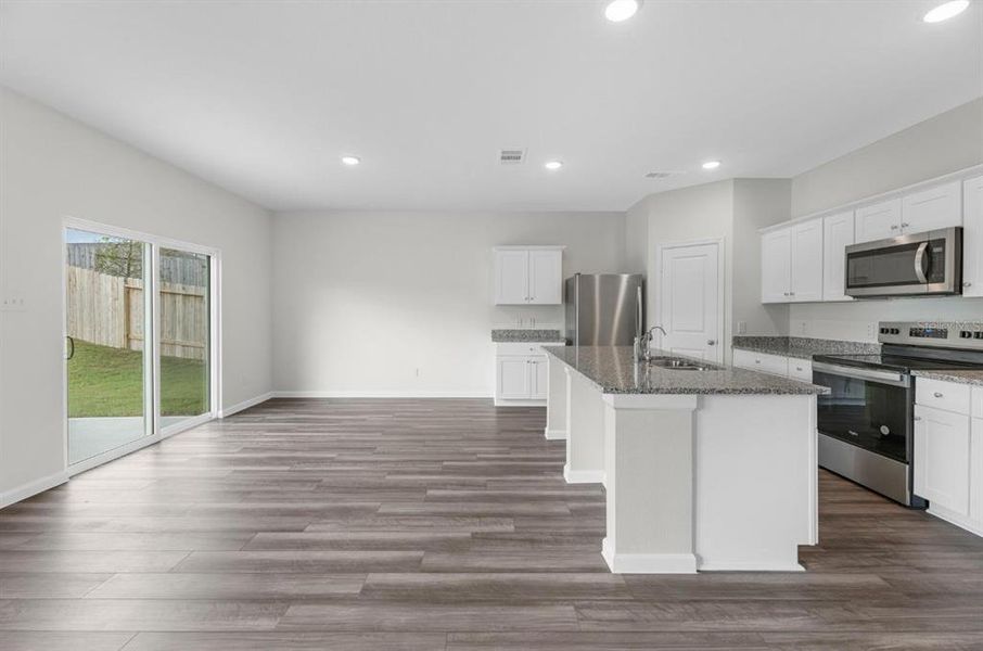 Furnished interior view inside a new home in Oakfield Lakes, Parrish (Image 5).
