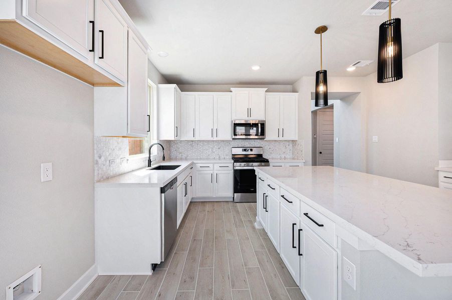 Furnished interior view inside a new home in Candela South, Richmond (Image 5).