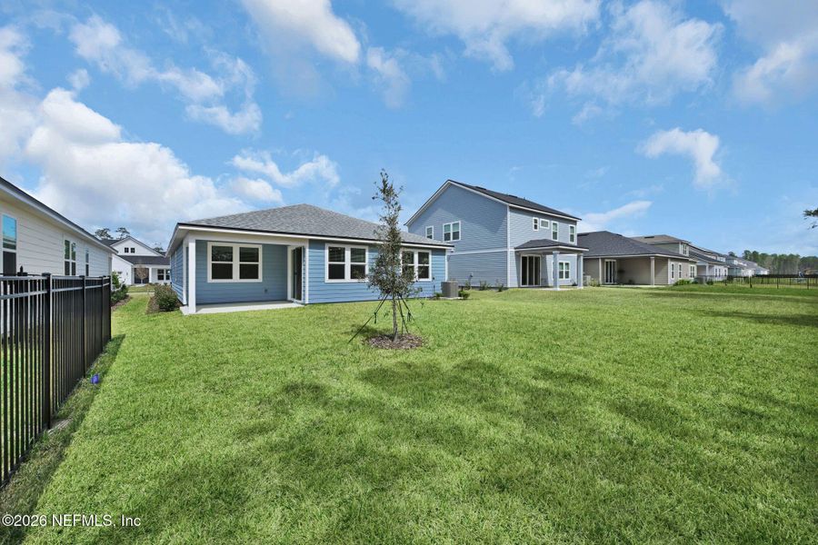 Exterior details and patio area of a home in Hyland Trail, Green Cove Springs (Image 23).