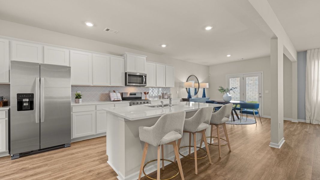 Representative furnished interior of a home built from the Halton by D.R. Horton in Brooks Station, Dacula (Image 3).