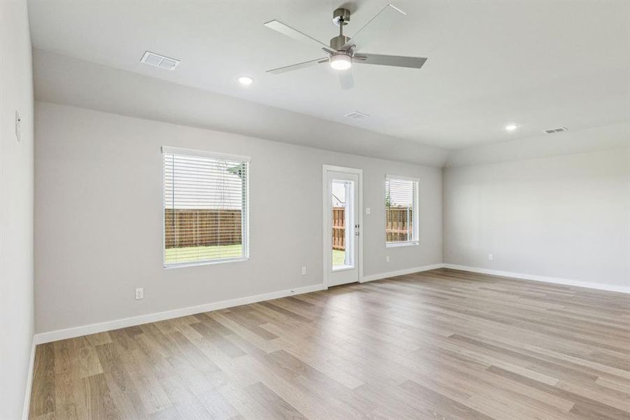 Living Room in the Harper home plan by Trophy Signature Homes – REPRESENTATIVE PHOTO