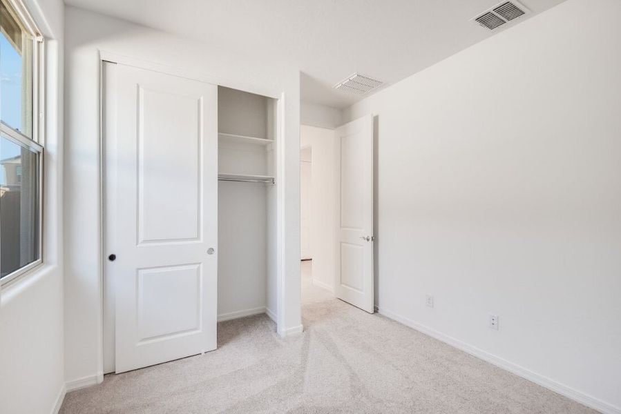 Spacious, unfurnished interior of a new home in Artisan at Asante, Surprise (Image 19).