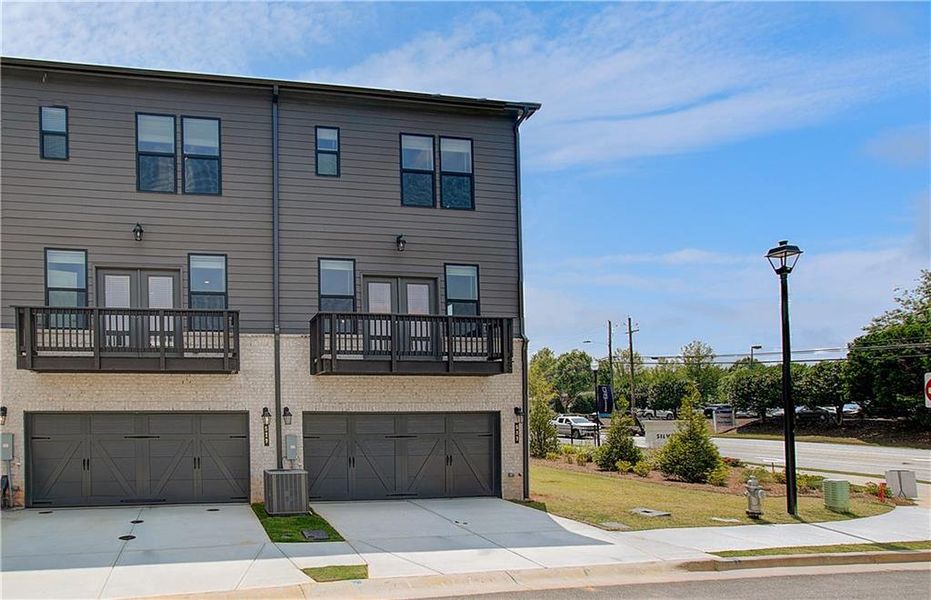 Front exterior of a new home in Silverock, McDonough, GA, highlighting curb appeal (Image 19).