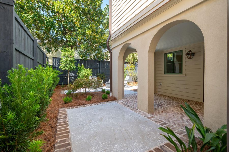 Exterior details and patio area of a home in , Charleston (Image 30).