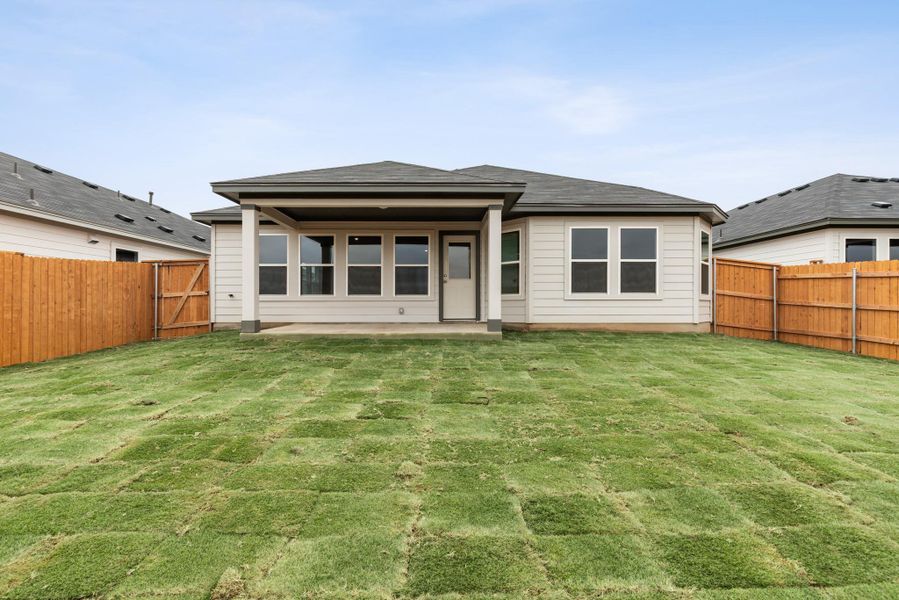 Exterior details and patio area of a home in Marble Creek Crossing, Austin (Image 17).