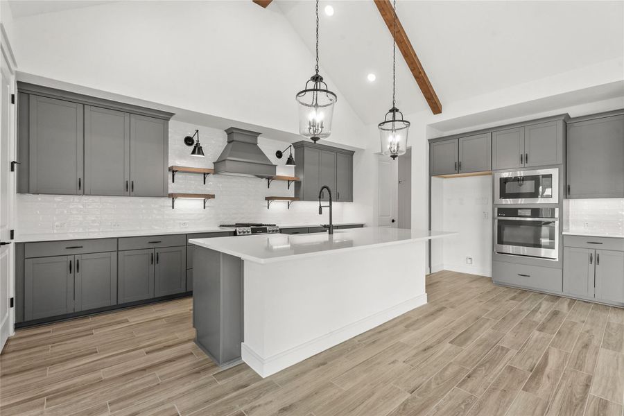 Gorgeous island kitchen (*Photo not of actual home and used for illustration purposes only.)