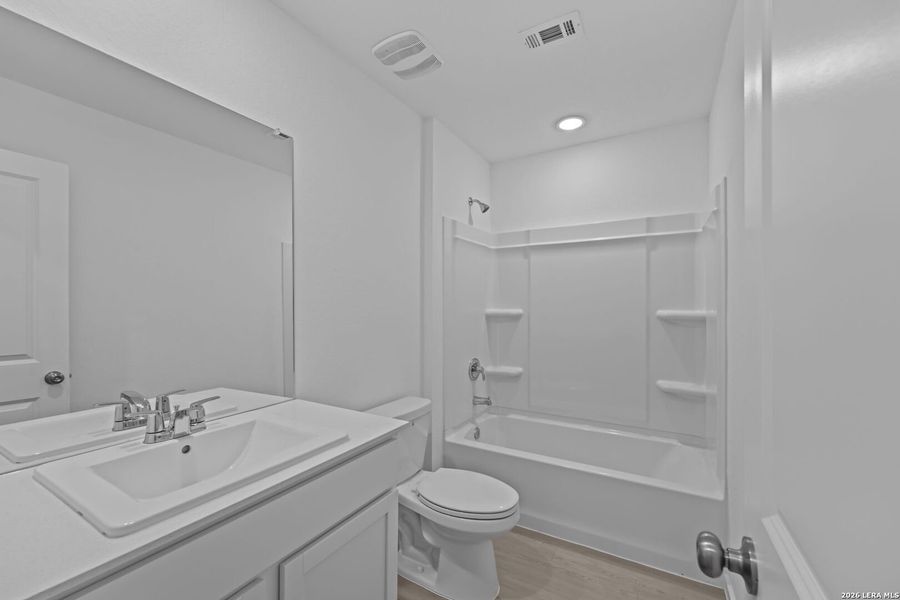 Furnished interior view inside a new home in Guadalupe Ridge, New Braunfels (Image 6).