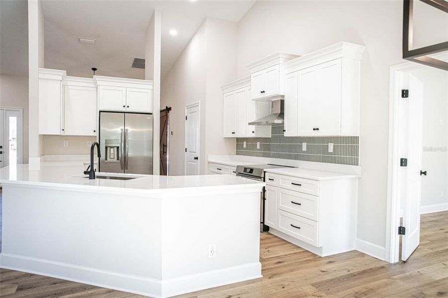 Furnished interior view inside a new home in , Weeki Wachee (Image 13).