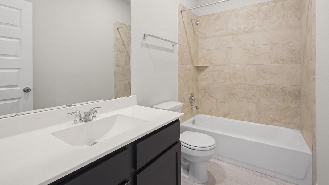 Representative furnished interior of a home built from the The Benbrook by Legend Homes in Bluestem, Brookshire (Image 8).