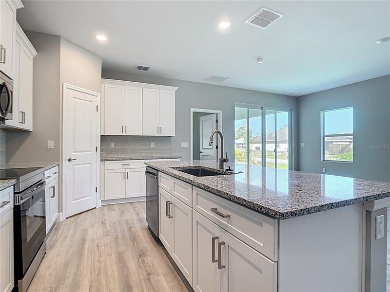 Furnished interior view inside a new home in , North Port (Image 7).