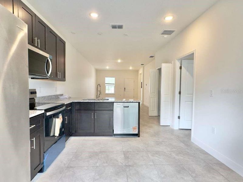 Furnished interior view inside a new home in , Ocala (Image 10).