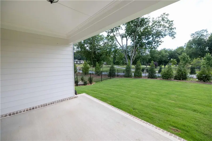 Exterior details and patio area of a home in Promenade at Sawnee Village, Cumming (Image 4).