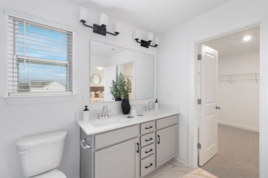 Representative furnished interior of a home built from the TA1800 by True Homes in Streamside, Red Cross (Image 14).