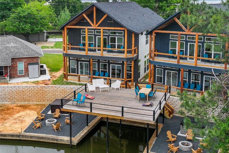 aerial view of boat dock and home
