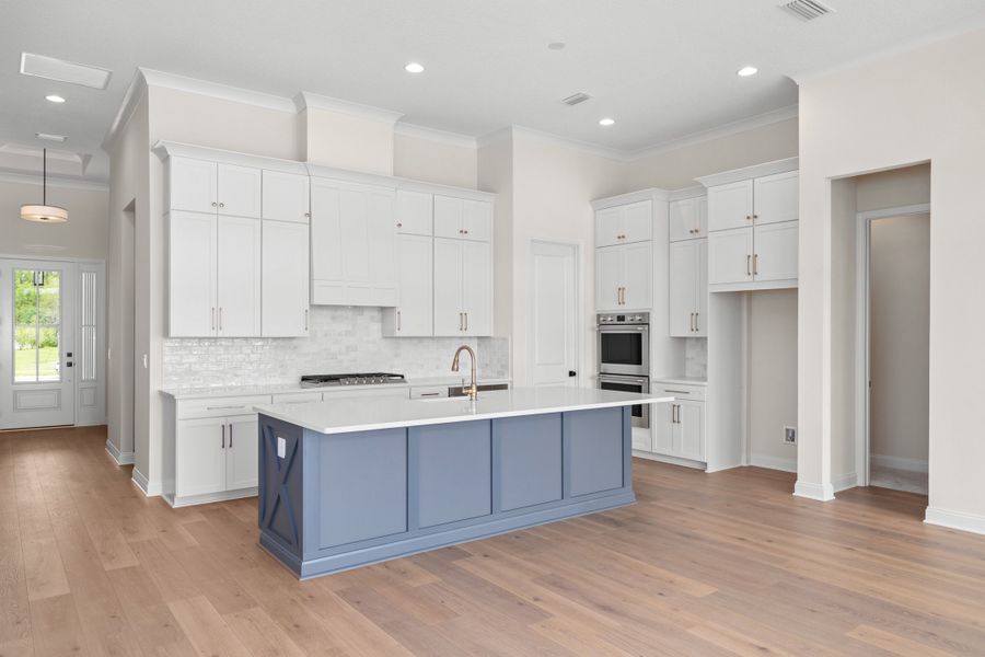 Representative furnished interior of a home built from the Aurora by Riverside Homes in Hidden Creek at SilverLeaf, St. Augustine (Image 9).