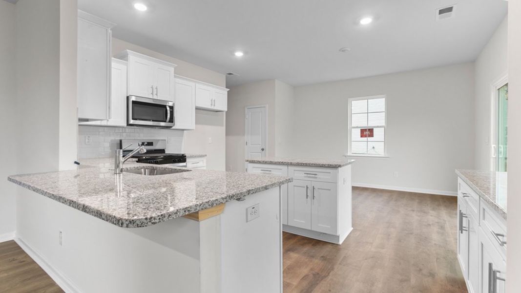 Furnished interior view inside a new home in Bryson Park, Lexington (Image 3).