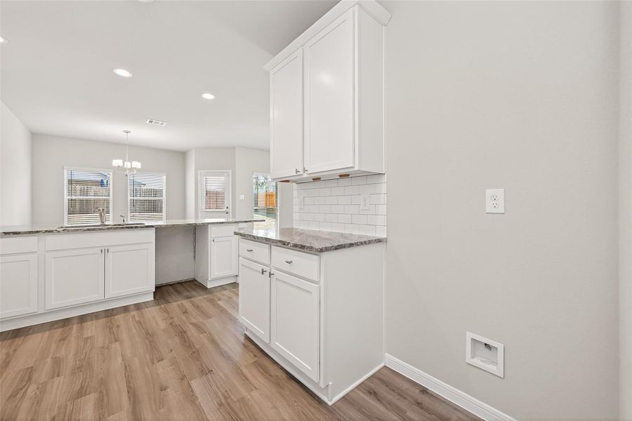 Furnished interior view inside a new home in Woodland Lakes, Houston (Image 7).