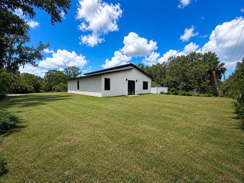 Exterior details and patio area of a home in , Port Charlotte (Image 3).