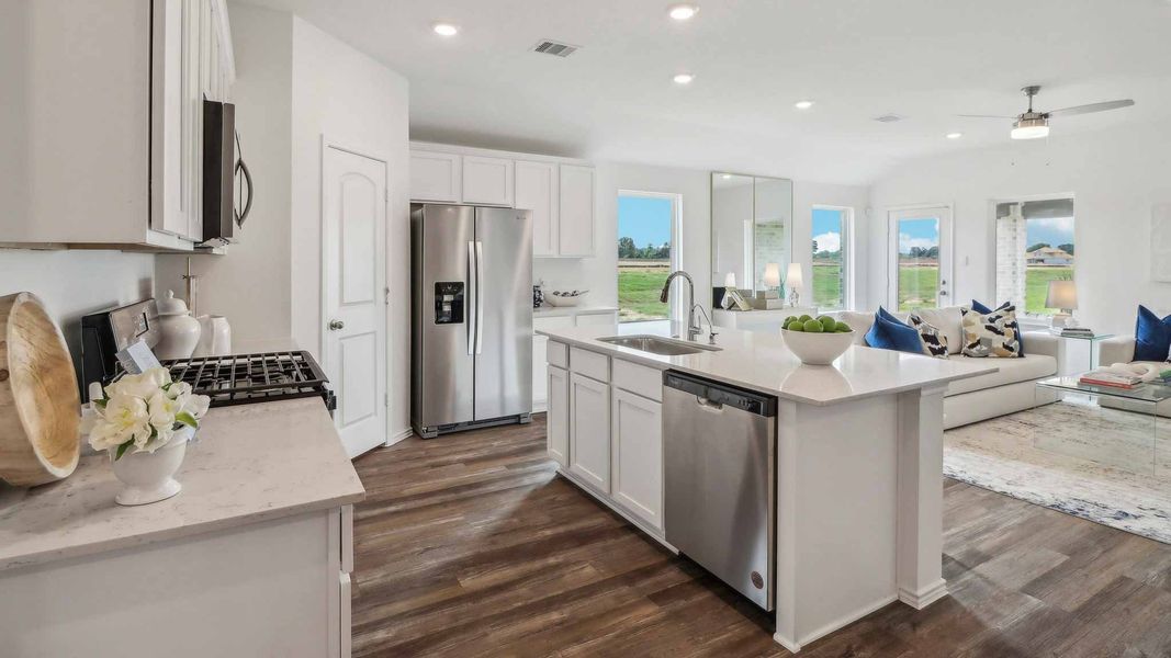 Furnished interior view inside a new home in Sunterra, Katy (Image 12).