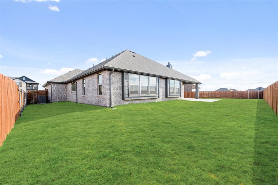 Exterior details and patio area of a home in Villages of Walnut Grove, Midlothian (Image 23).