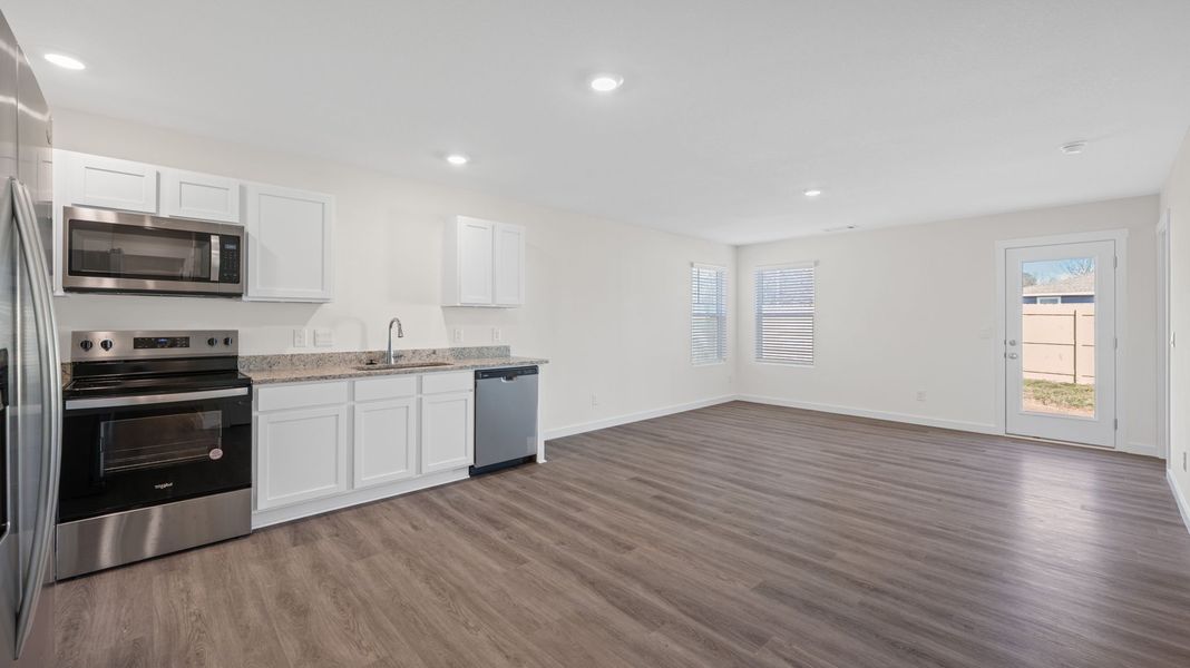 Furnished interior view inside a new home in Crescent Ridge, Niota (Image 3).