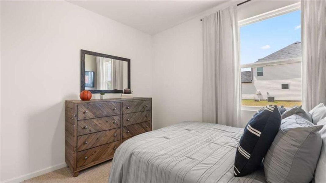 Furnished interior view inside a new home in The Preserve at Agricultural Village, Perry (Image 25).