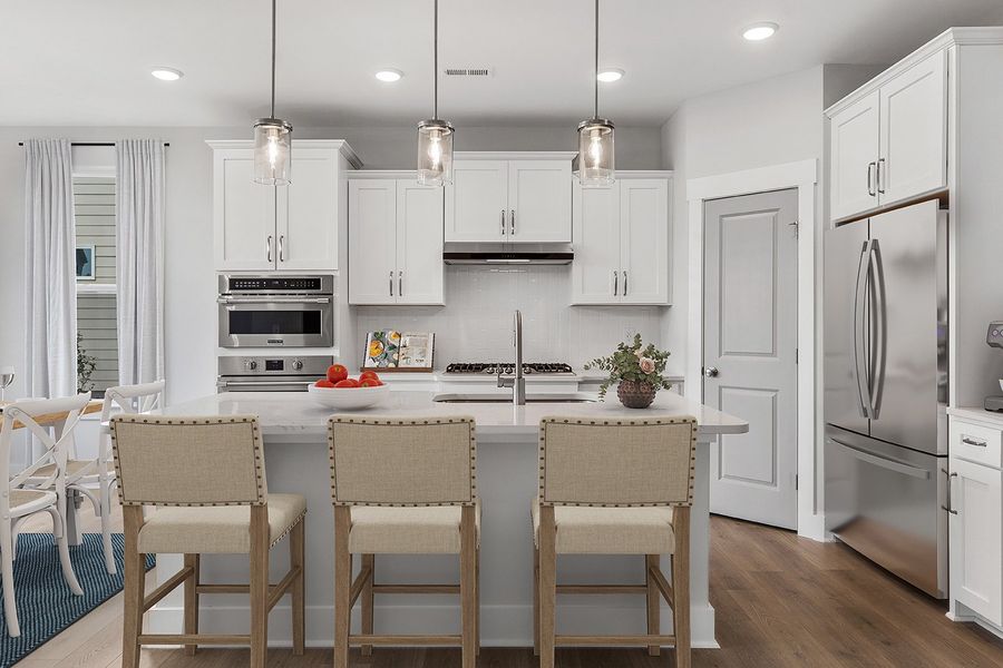 Representative furnished interior of a home built from the The Chandler by RobuckHomes in Windwater, Hampstead (Image 9).