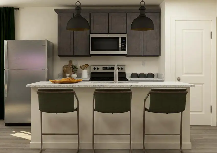 Rendering of a kitchen with dark cabinetry and stainless steel appliances. Rendering of a kitchen with dark cabinetry and stainless steel appliances.