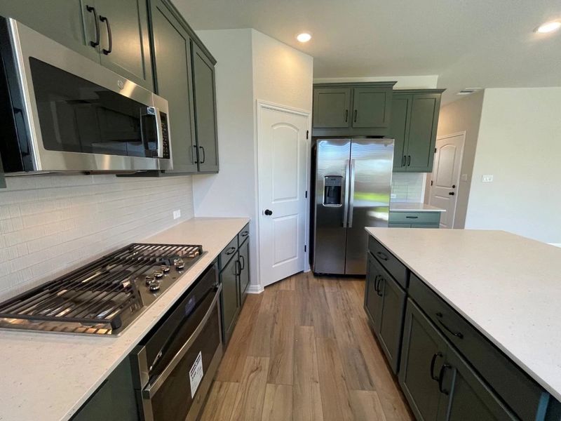 Furnished interior view inside a new home in Covered Bridge, Hutto (Image 8). Furnished interior view inside a new home in Covered Bridge, Hutto (Image 8).