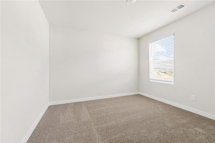 Spacious, unfurnished interior of a new home in Fern Dale, Fairburn (Image 16).