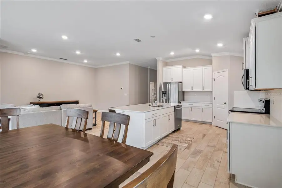 Furnished interior view inside a new home in Sawmill Branch, Palm Coast (Image 4). Furnished interior view inside a new home in Sawmill Branch, Palm Coast (Image 4).