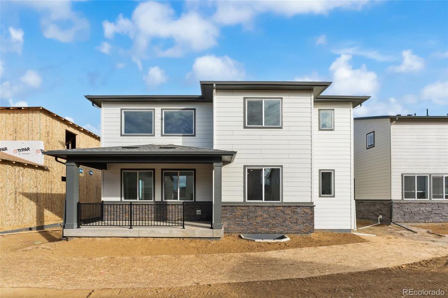 Exterior details and patio area of a home in Harvest Crossing, Aurora (Image 4).