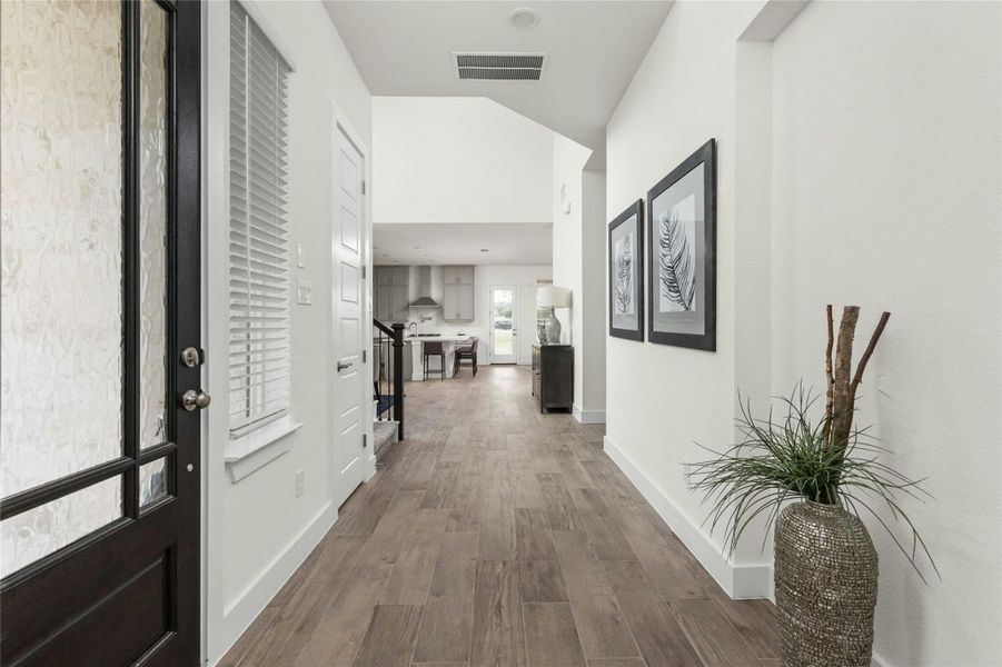Furnished interior view inside a new home in Rough Hollow, Lakeway (Image 5).