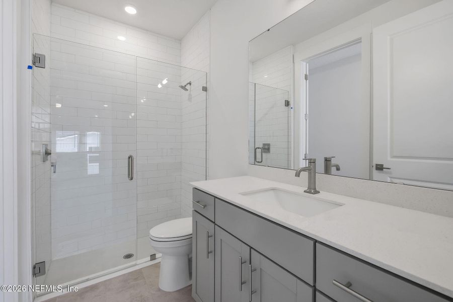 Furnished interior view inside a new home in North Beach Townhomes, Jacksonville Beach (Image 13).