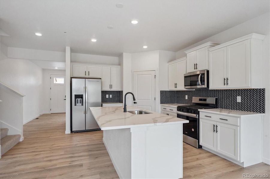 Furnished interior view inside a new home in Timberleaf, Thornton (Image 6).