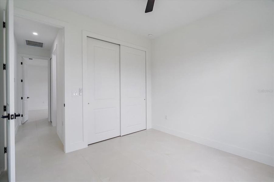 Spacious, unfurnished interior of a new home in , Port Charlotte (Image 19).