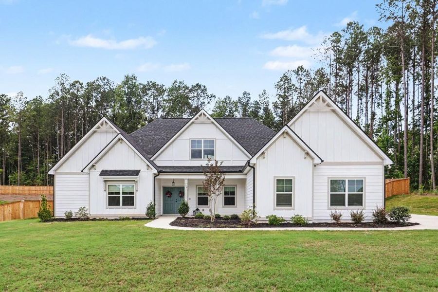 Front exterior of a new home in Belle Hall, Newnan, GA, highlighting curb appeal (Image 27).