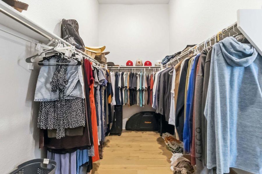 A well-organized walk-in closet offers ample storage and easy access to wardrobe essentials.