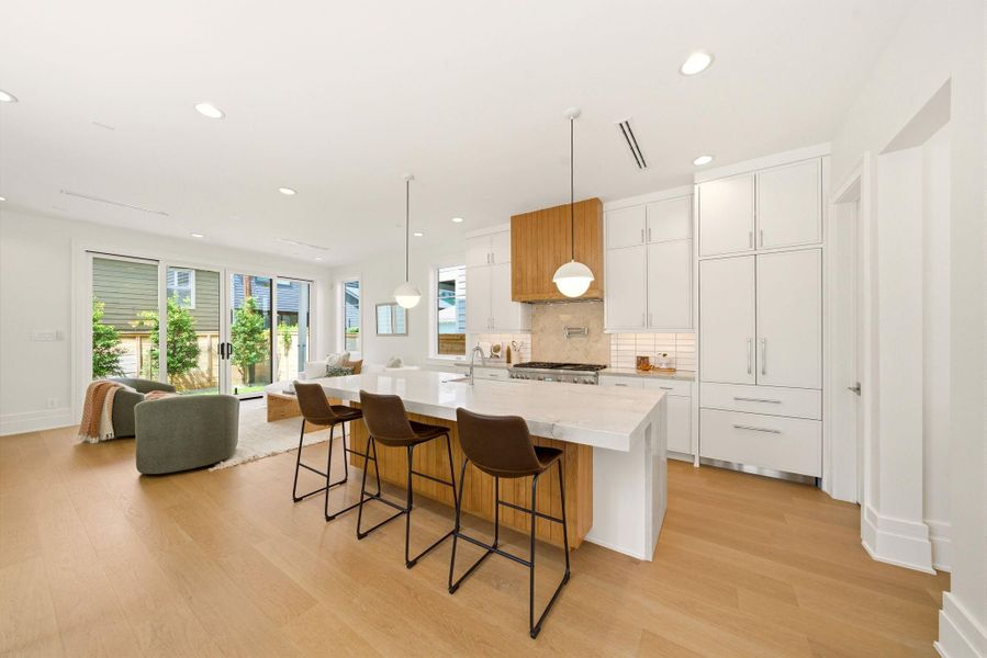 Beautifully designed chef’s kitchen with abundant storage, sleek finishes, and expansive entertaining space. Beautifully designed chef’s kitchen with abundant storage, sleek finishes, and expansive entertaining space.