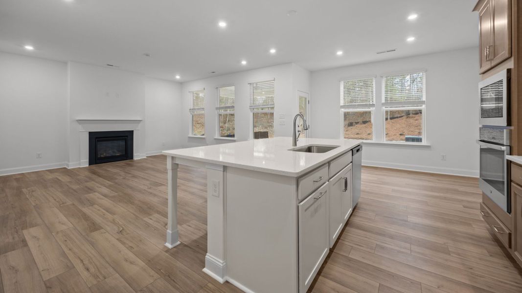 The Beramont Plan by DR homes in Farms at Bellingham, Mooresville, NC - Kitchen & Living Space