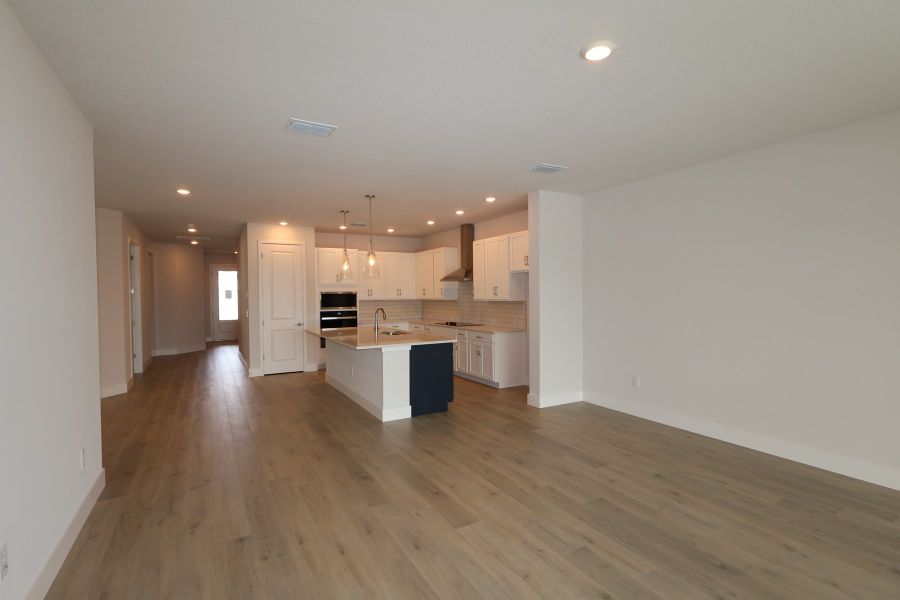 Spacious, unfurnished interior of a new home in North River Ranch – Garden Series, Parrish (Image 6).
