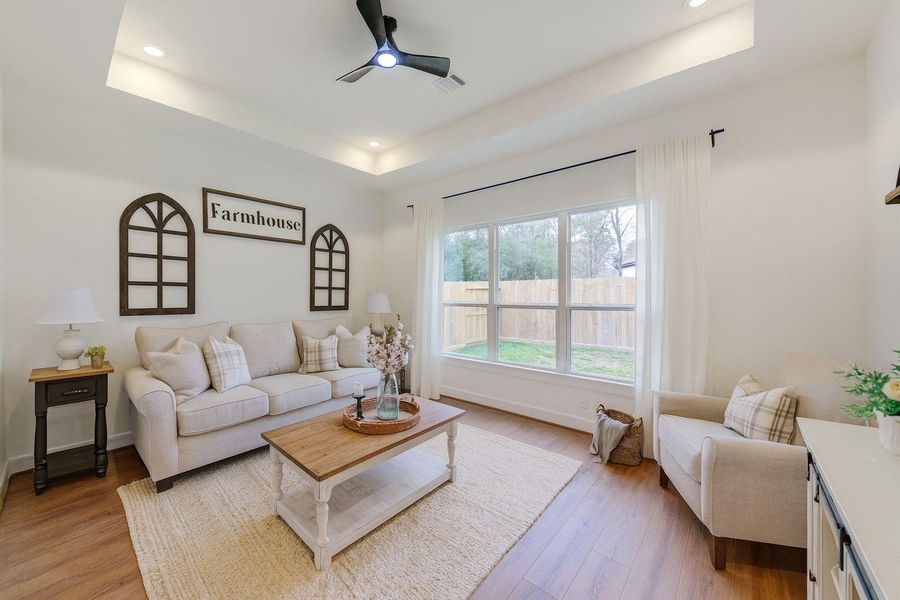 Explore versatile living with this beautifully staged room, perfect as a fourth bedroom or an inviting extra living space. Explore versatile living with this beautifully staged room, perfect as a fourth bedroom or an inviting extra living space.